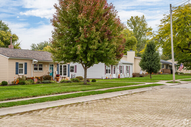 Ranch homes line a walkable brick road  in Northwest Davenport, Iowa
