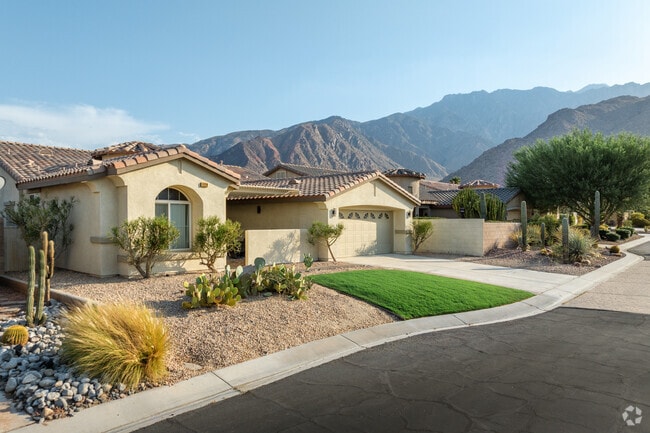Terracotta roofs help cool a Spanish-style home in Mountain Gate.