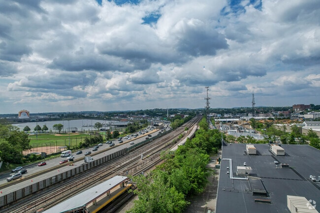 Uphams Corner-Jones Hill has its own T stop and is two stops away from South Station.