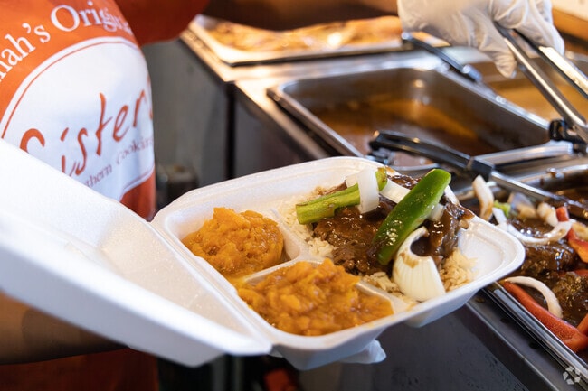 Try award winning southern food at Sisters of the New South.