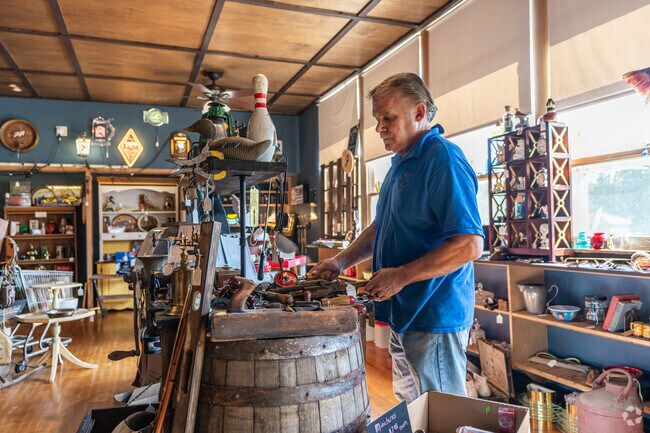 The Rustic Barrel offers antiques and unique gifts off McHenry Street, north of the lake.