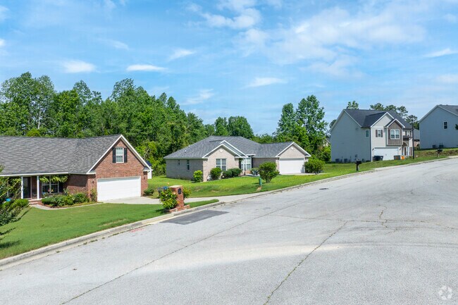 The mix of home styles in Cross Creek includes 20th century ranches and more recent new build properties.