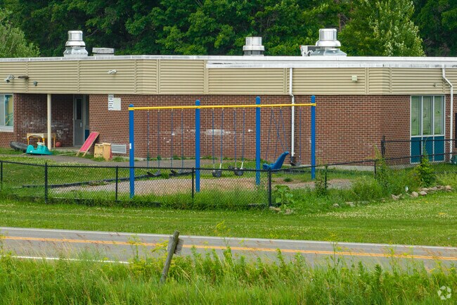 Enfield School also has a swing set for students.