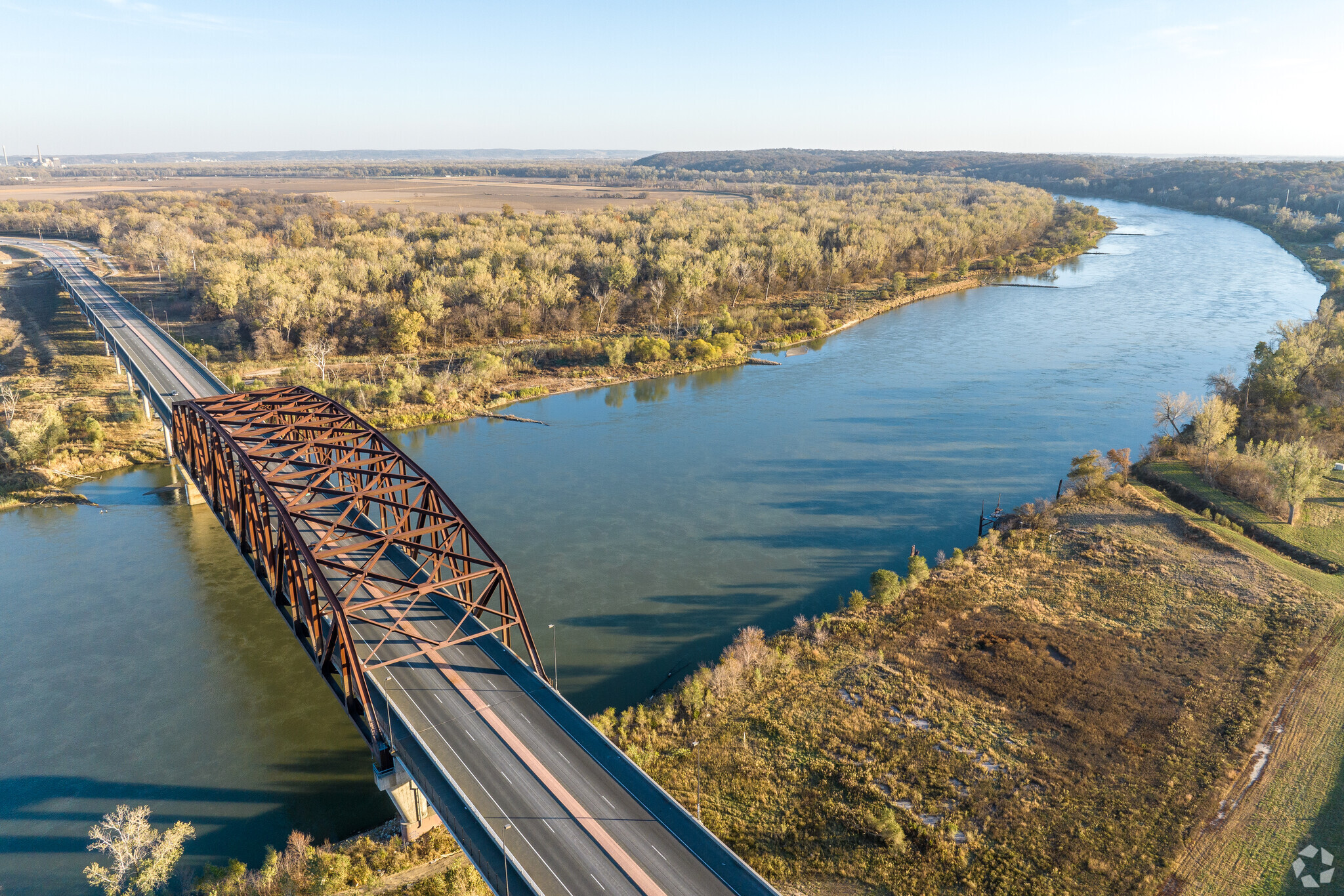 The Missouri River is crossed by Vets Bridge and creates the boundary between Iowa and Nebraska.