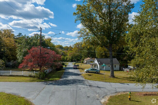 many South View streets are shaded by tall mature treees for shade and privacy .