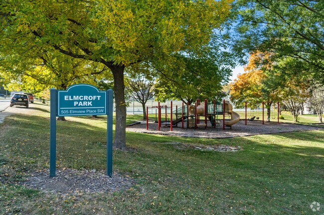 Nestled on Elmview Place, Elmcroft Park's lush greenery provides a peaceful escape for families.