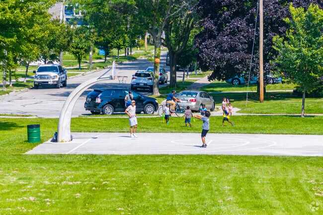 Friends gather to play basketball at Farlin Park in Green Bay, WI.