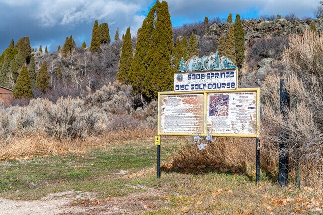 Families enjoy playgrounds and open spaces at Kelly Park in Soda Springs.