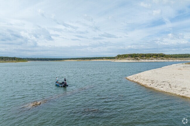 Russell Park by San Gabriel River offers trails and a convenient boat dock for fishermen.