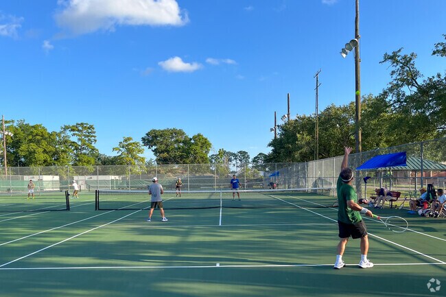 Terrytown Playground provides lighted tennis courts for community recreation.