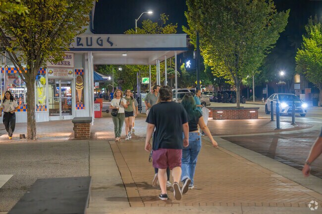 Residents and tourists are often out late on Toomer's Corner in Downtown Auburn.