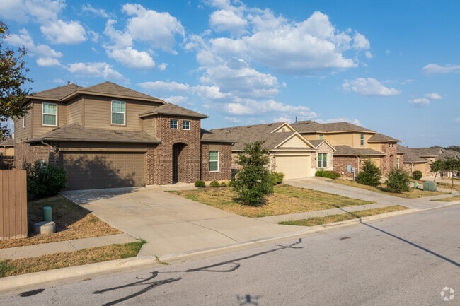 Parmer Lane features elegant Prairie-style homes with horizontal lines and low roofs.