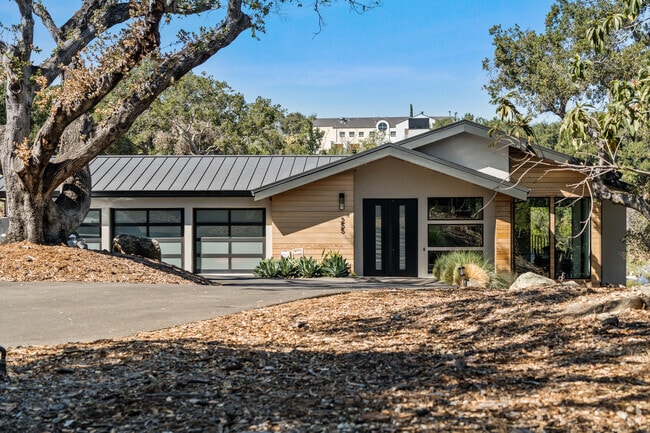 Woodside Hills boasts modern ranch-style homes, blending sleek design with nature's beauty.