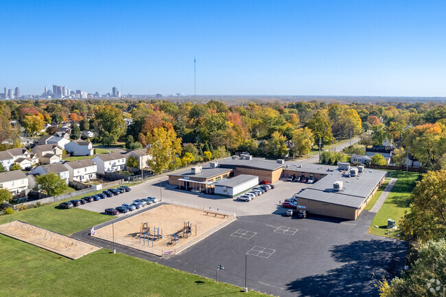 East Franklin Elementary School in Outer Greater Hilltop features a playground for children.