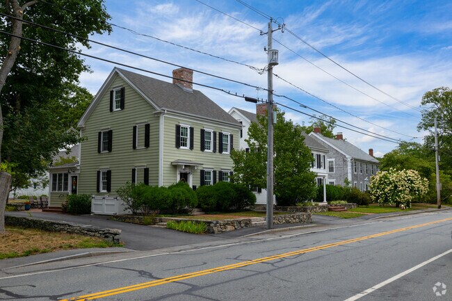 Explore the charm of Swansea’s Main Street lined with classic New England architecture.