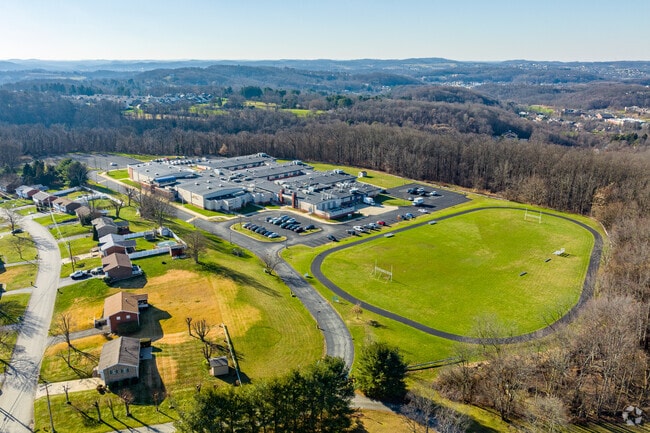 Wendover Middle School is on a private lot surrounded by mostly forest.