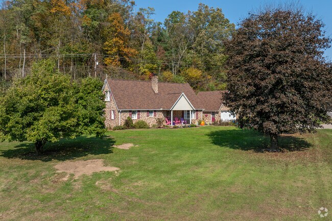 You can find a Cape Cod with a large private lawn in Jordan.