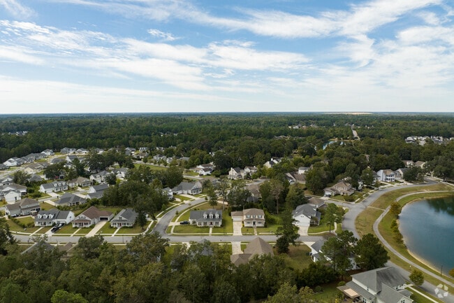 Residents enjoy short walks to Berwick’s scenic neighborhood lake.