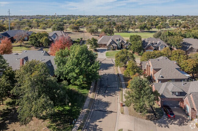 In Fairway Estates, residents appreciate the large homes set amid dense, ancient trees.
