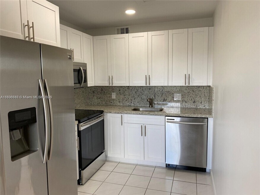 18101 NW 68th Ave unit D-101, Hialeah, FL 33015 - photo 1