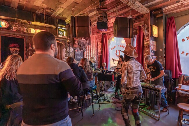 Skinny Dennis is a honky-tonk saloon pairing a woody space with beer & live music.