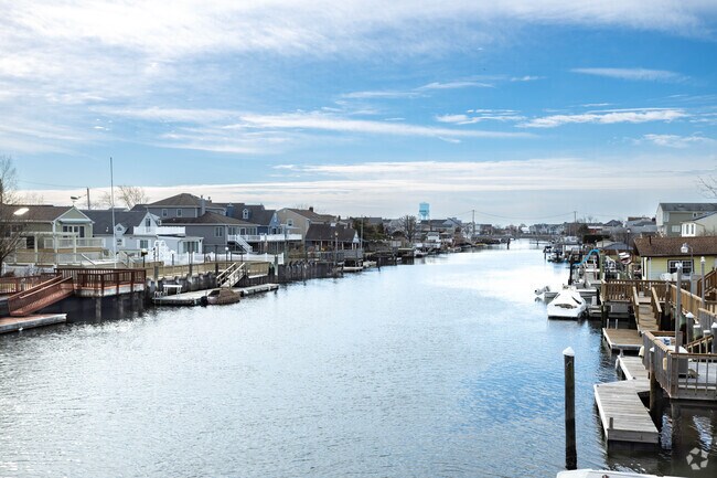 Some Island Park homes sit right on the water, offering private docks and bay views.