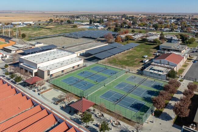 There are tennis courts at Coalinga High School in Coalinga.