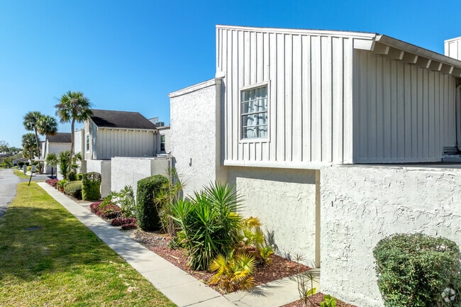 Modern stucco condominiums offer a more minimal list style with homes around the $150-$200K.