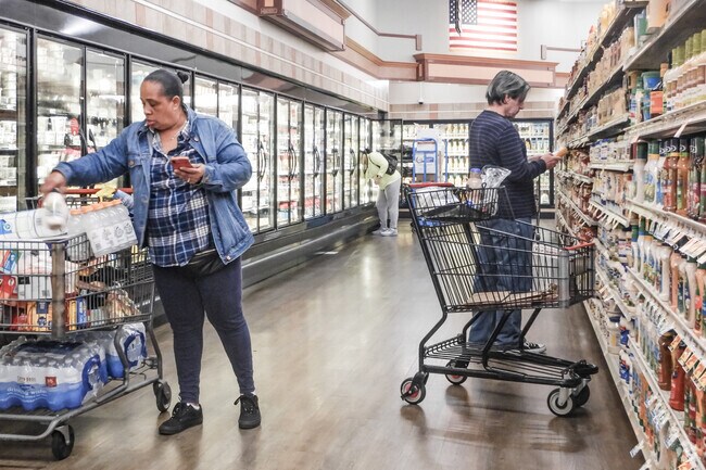 Plaza residents stock up at Stater Bros on Spring Street.