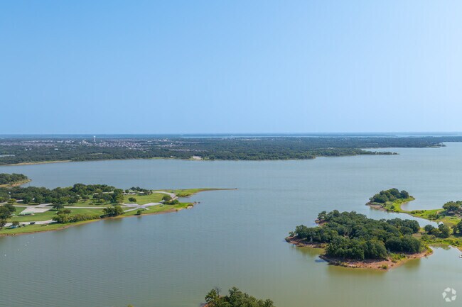 Lewisville Lake borders Copper Canyon with lakefront woodlands and trails.