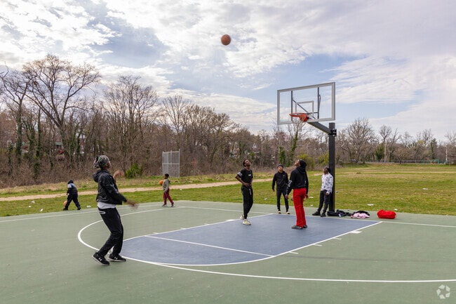 People can play basketball with some friends on the full court at Chinquapin Park.
