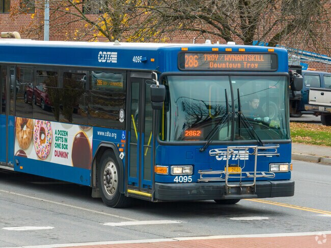 Bus stops throughout the neighborhood take residents where they need to go.