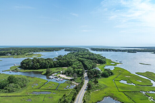 A winding road leads you into Monomoscoy Island.