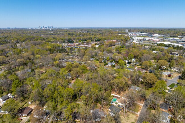From a bird's eye view of East Forest, uptown Charlotte is seen from a distance.