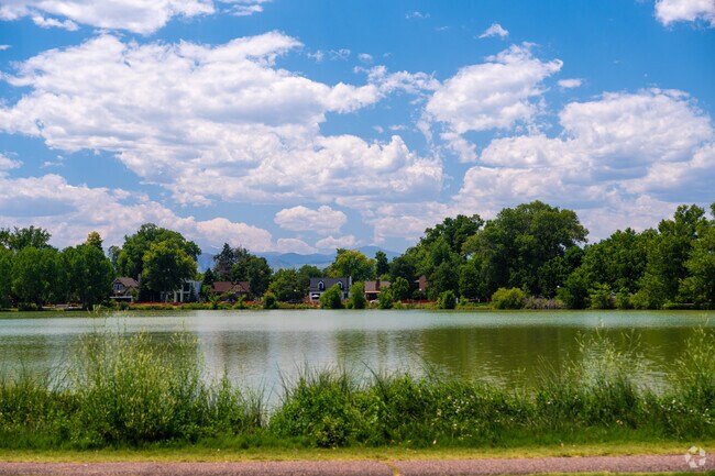 Enjoy views of the Rocky Mountains from across the north lake in Washington Park.