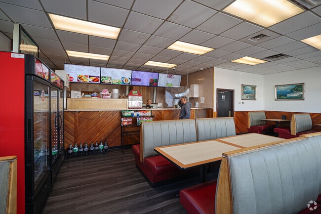Nikko's Pizza can be found right in Broad Meadow Brook near other shopping areas.