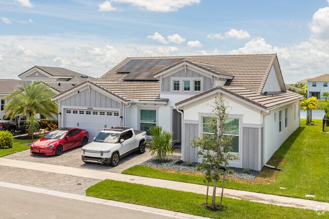 Live in a cozy modern-style home in Westlake, West Palm Beach, FL.