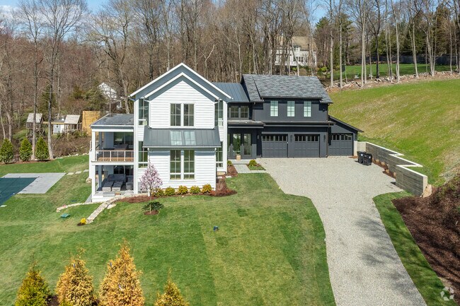 21st century homes with pools and multi-car garages are common in Weston.