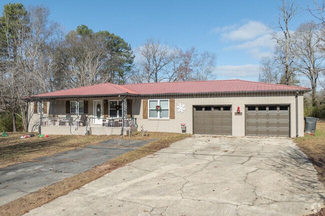 Rock Creek homes have spacious, flat lawns surrounded by mature trees.
