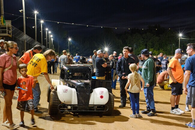 Fans take to the track to meet drivers at the Hagerstown Speedway.