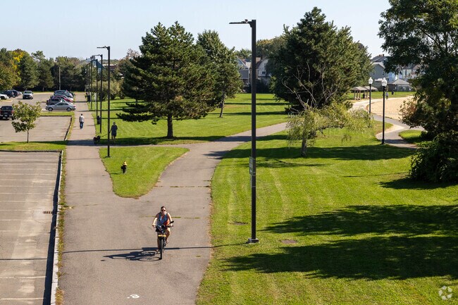 Bikers love the wide paths at Constitution Beach in Harbor View-Orient Heights.