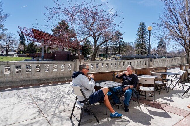 The Riverwalk is lined with patios for enjoying a cold beverage next to the water in the sun.