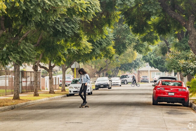 Tree-lined streets canopy the affordable homes throughout the city of Norwalk.