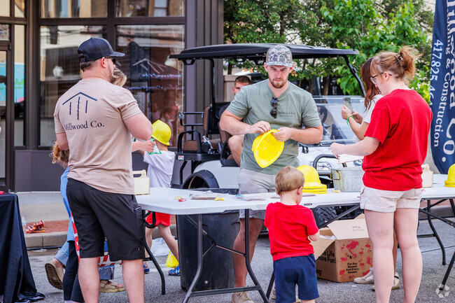 Vendors interact with families at Joplin's Third Thursday.