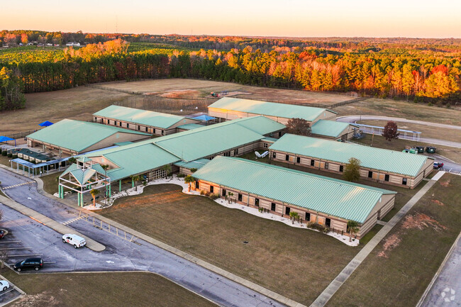 The Forest Heights Elementary School in Columbia is set on a private lot surrounded by trees.
