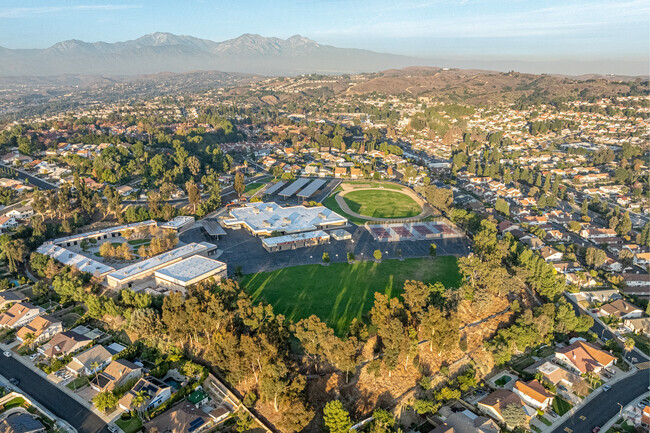 Aerial view of Chaparral Middle School in Diamond Bar and the surrounding San Gabriel Mountains
