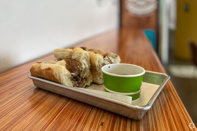 Enjoy a French Dip sandwich at E.A.R.L.'s.