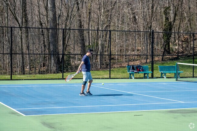 Challenge friends to a tennis match at The Park at East Hills.