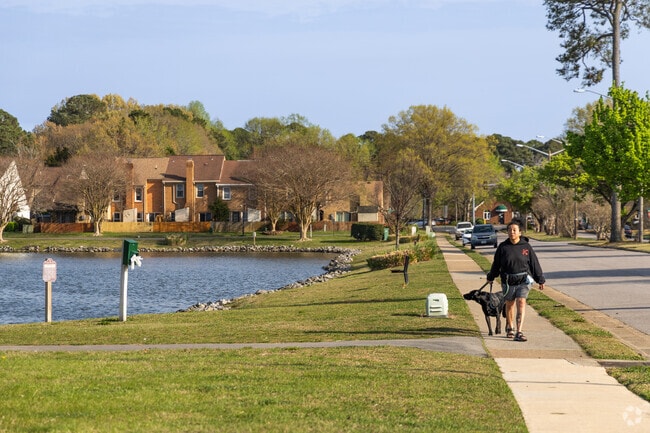 Residents enjoy walking their dogs along the scenic paths surrounding Kempsville Lake.​