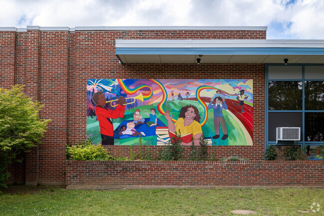 A colorful mural greats you at the front of Hancock Elementary School in Brockton.